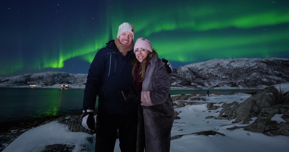 Small-group northern lights chase in snowy countryside
