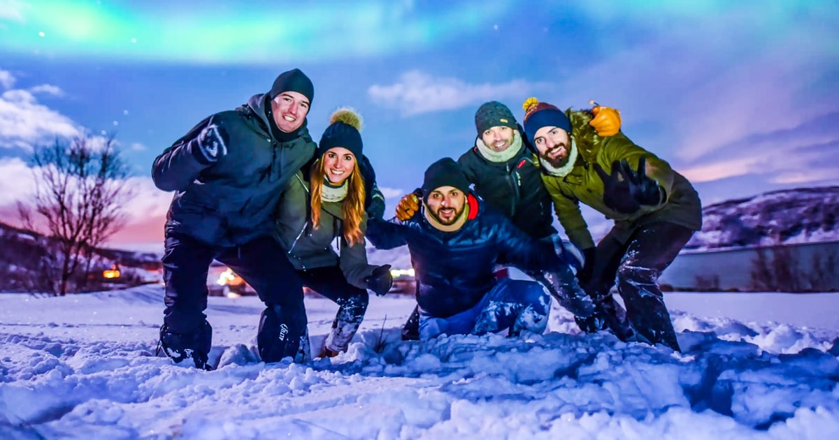 Northern lights safari group under the aurora near Tromsø