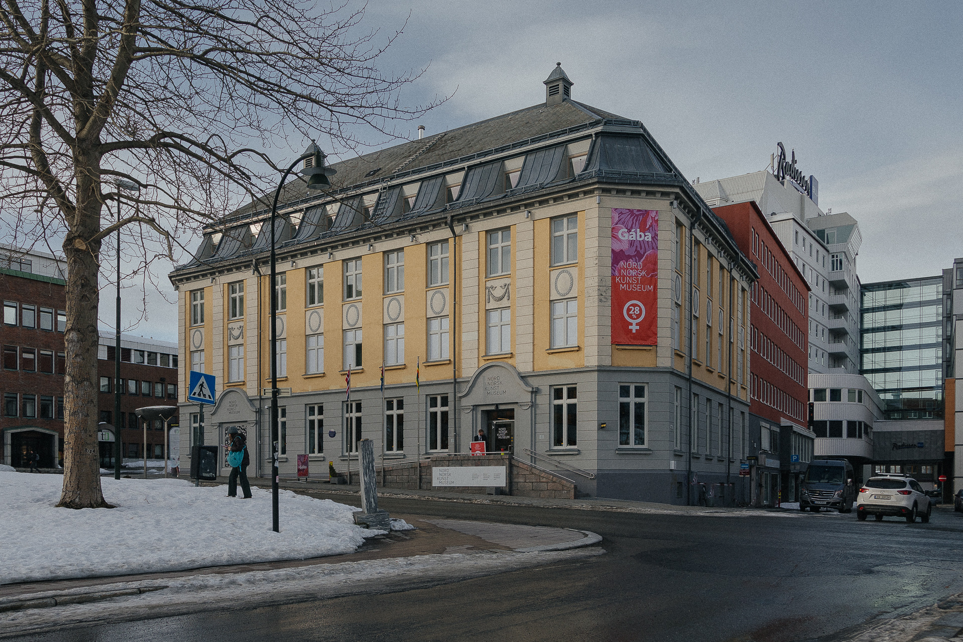 Exterior facade of Nordnorsk Kunstmuseum in Tromsø with past exhibition banners
