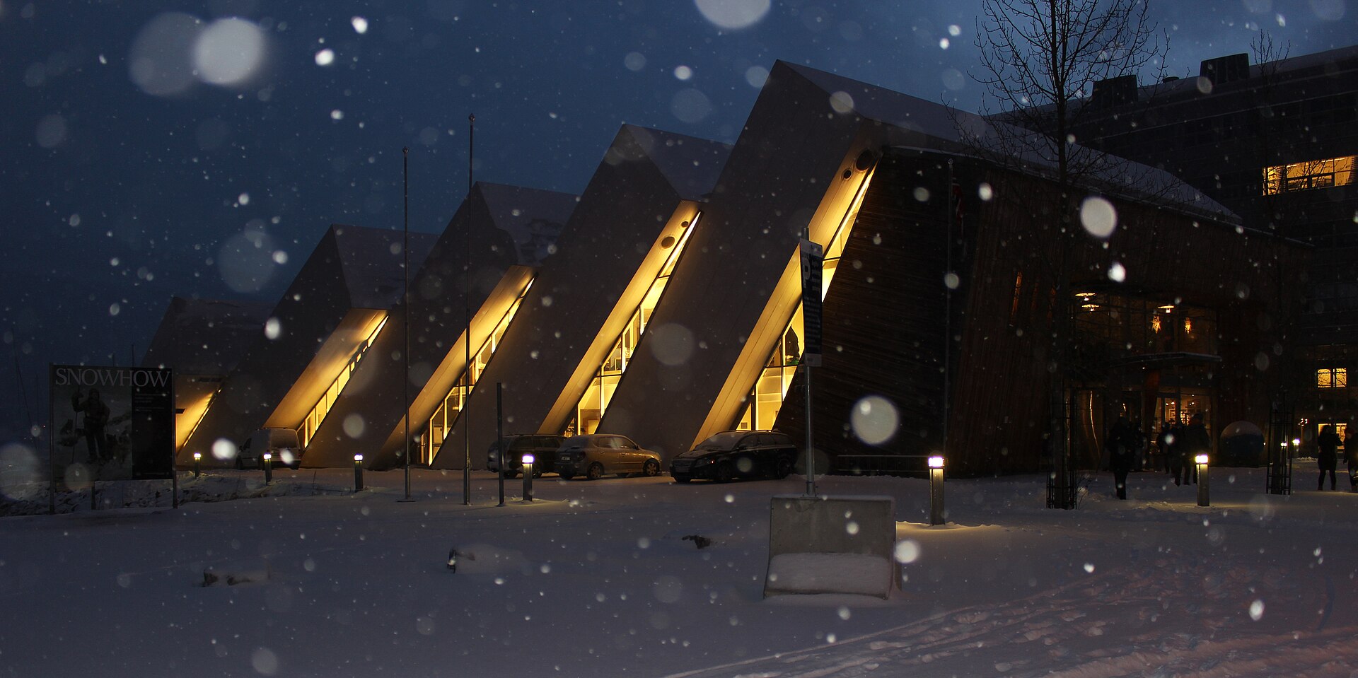 Polaria aquarium building on a snowy evening in Tromsø