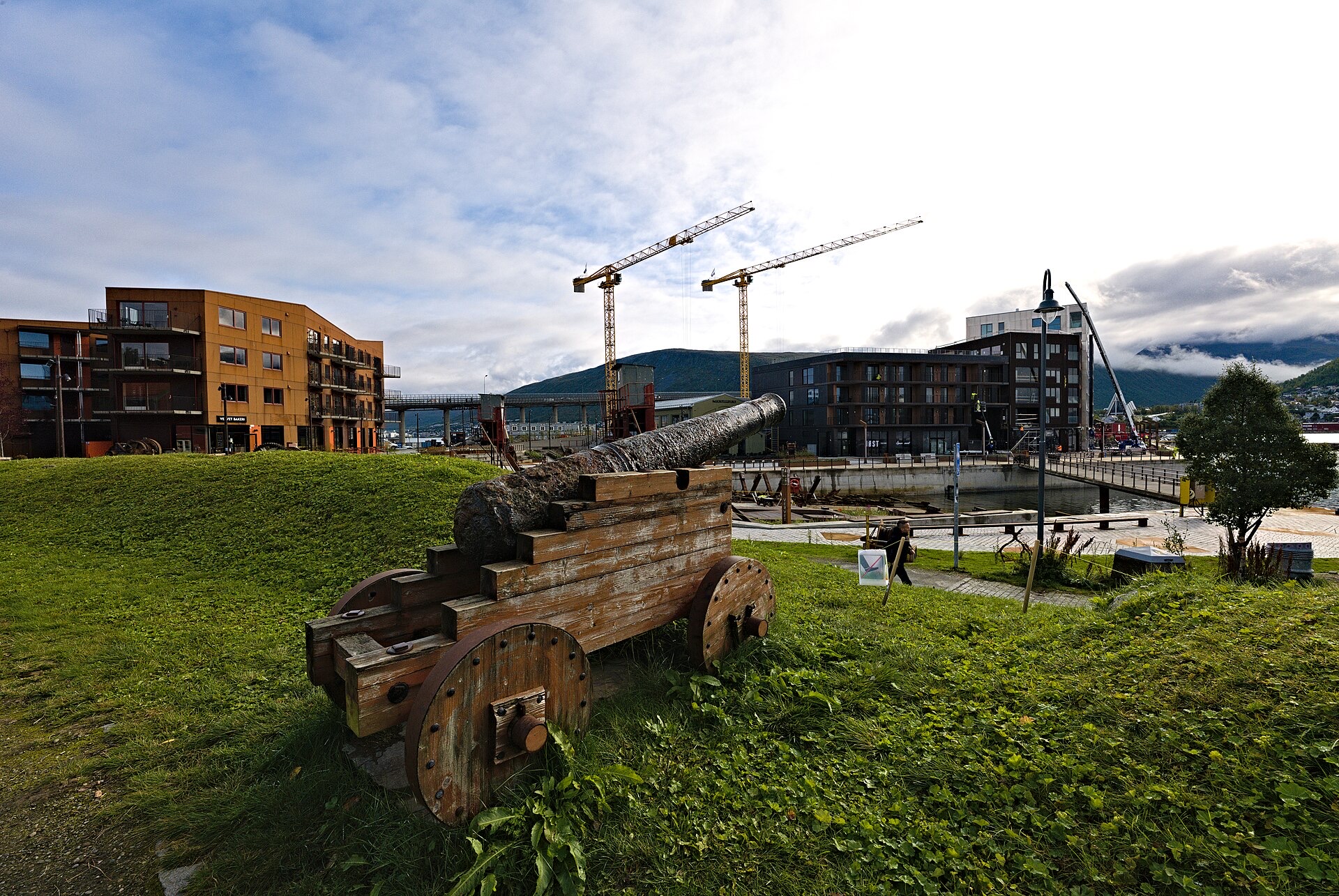 Cannon on the grassy Skansen earthwork near the Tromsø waterfront