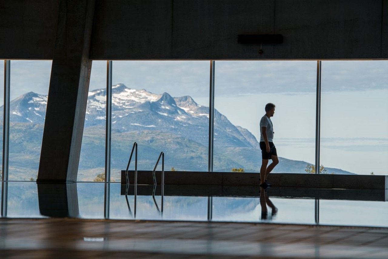 Sports pool at Tromsøbadet with mountain views through the windows