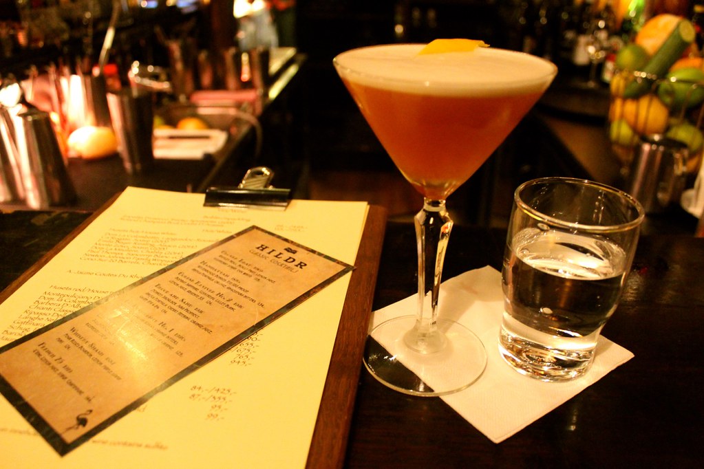 Cocktail served beside the menu at Hildr in Tromsø