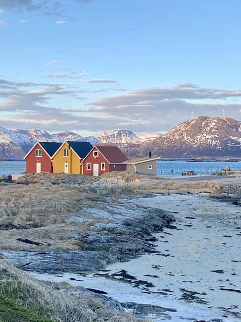 Coastal houses and mountains on Sommarøy near Tromsø
