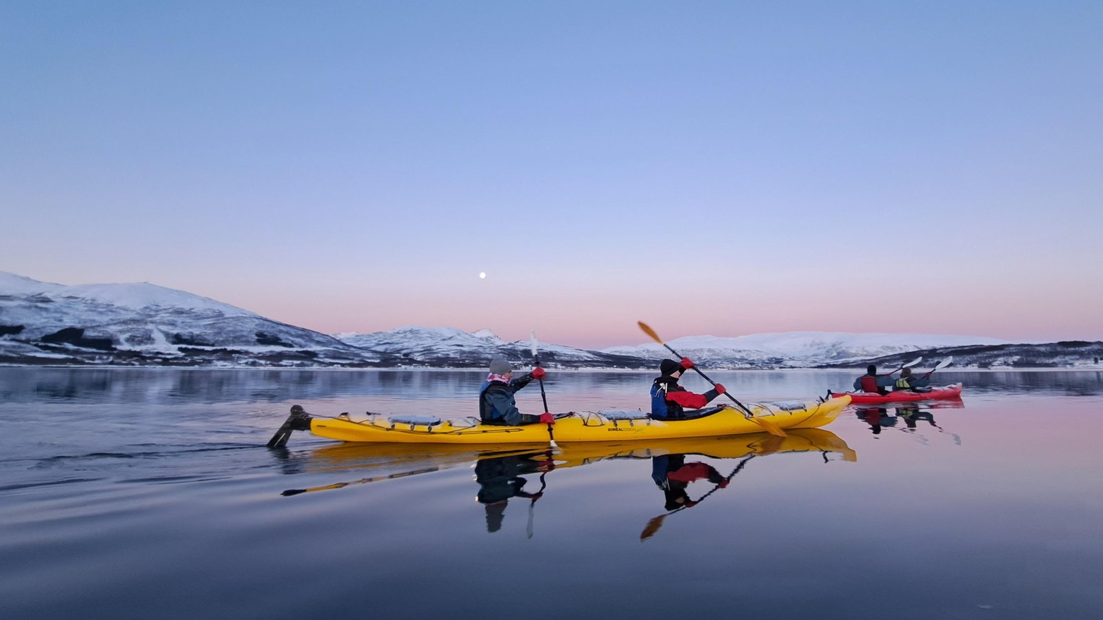 Kayakers exploring calm winter water near Tromsø — photo 1 of 5