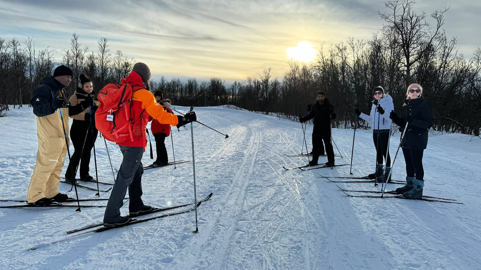 Beginner cross-country skiers practising on a snowy track — photo 1 of 5