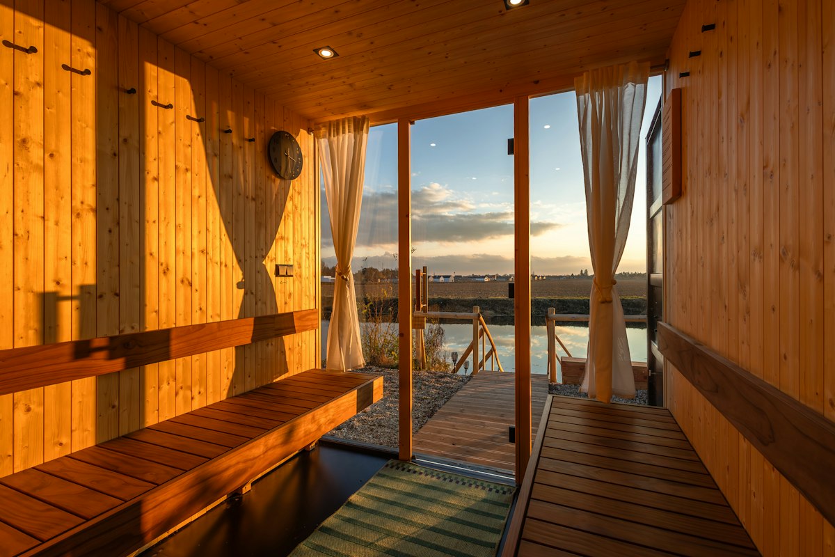 Illustrative waterfront sauna interior photographed outside Tromsø; not Pust